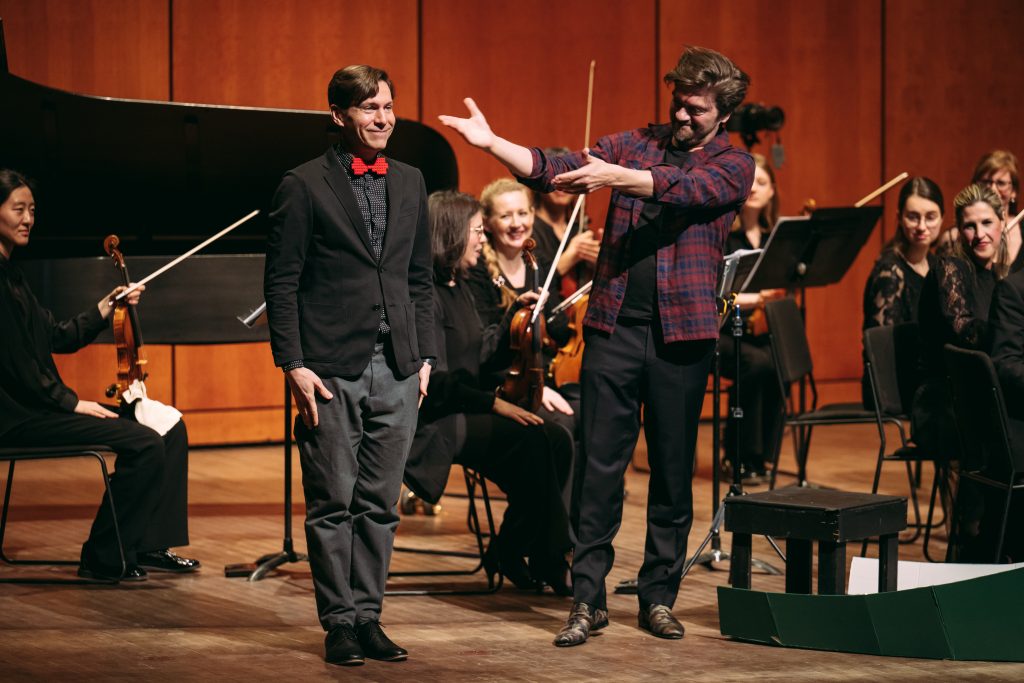 Maxime Goulet with Andrei Feher, Kornel Wolak, and the Orchestre classique de Montréal, during the performance of Fishing Story, at Salle Pierre-Mercure, in Montreal, on March 12, 2026. Photo by Tam Photography.