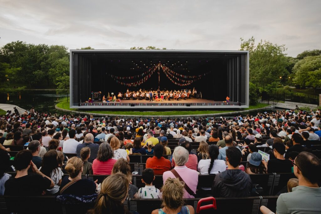 The Montreal Symphony Orchestra and Rafael Payare, during a performance of The Carnival of the Insects, at the Théâtre de Verdure, in Montreal, on August 8th, 2026. Photo by Gabriel Fournier.